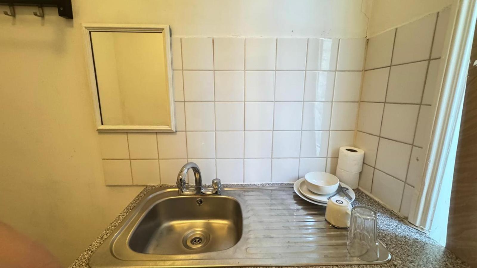 Camera Singola con Bagno in Comune